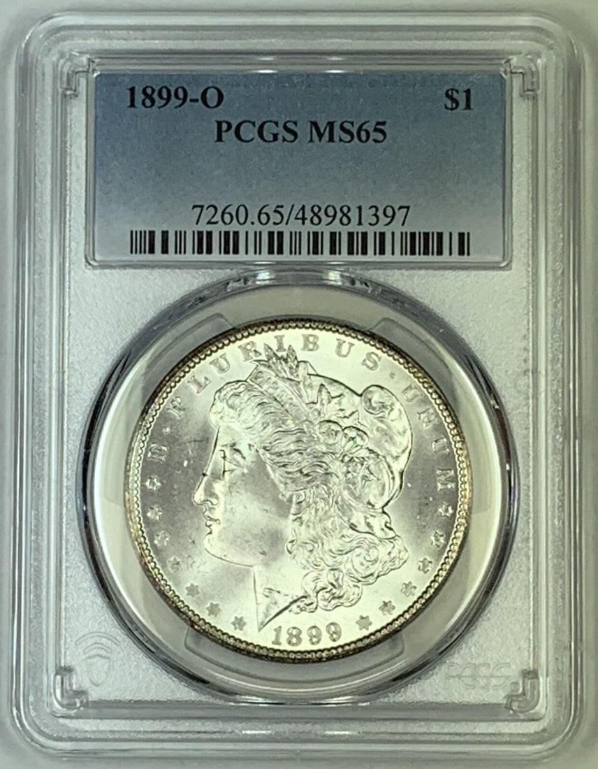 PCGS MS 65 1899-O Morgan Silver Dollar Uncirculated Certified Coin: PCGS MS 65 1899-O Morgan Silver Dollar Uncirculated Certified Coin This 1899-O Morgan Silver Dollar is a certified uncirculated coin graded MS 65 by PCGS. Minted in the United States, it features the