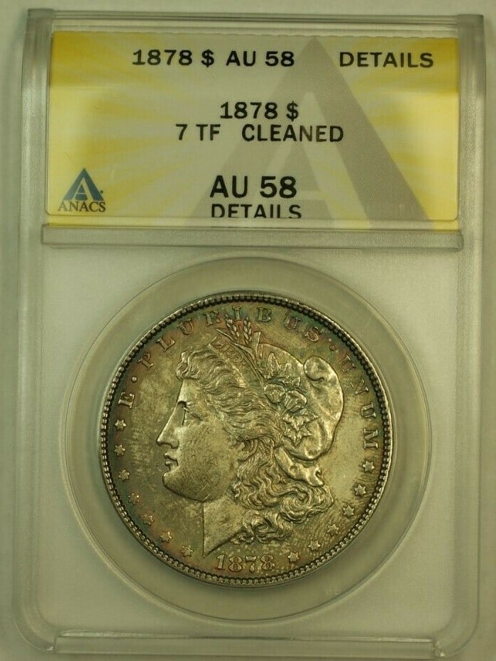 1878 7 Tail Feathers Morgan Dollar ANACS AU-58 Silver Coin Philadelphia Mint: 1878 7 Tail Feathers Morgan Dollar ANACS AU-58 Silver Coin Philadelphia Mint This is an 1878 Morgan Silver Dollar featuring the 7 Tail Feathers variety. The coin has been certified by ANACS with an AU