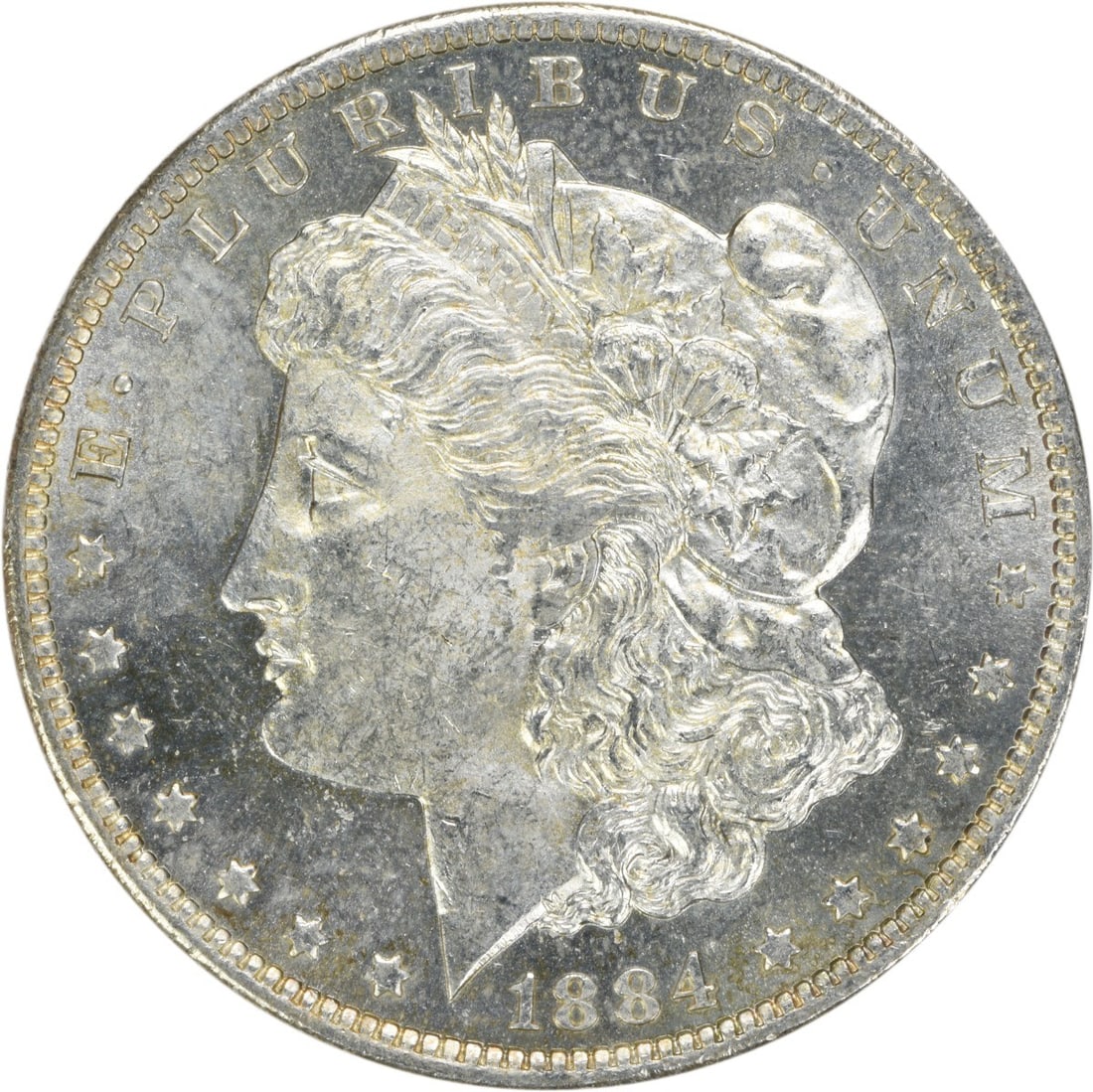 1884-O Morgan Silver Dollar Uncertified Brilliant Uncirculated: 1884-O Morgan Silver Dollar Uncertified Brilliant Uncirculated This striking 1884-O Morgan Silver Dollar showcases a brilliant uncirculated finish, reflecting its impressive quality. With a compositio