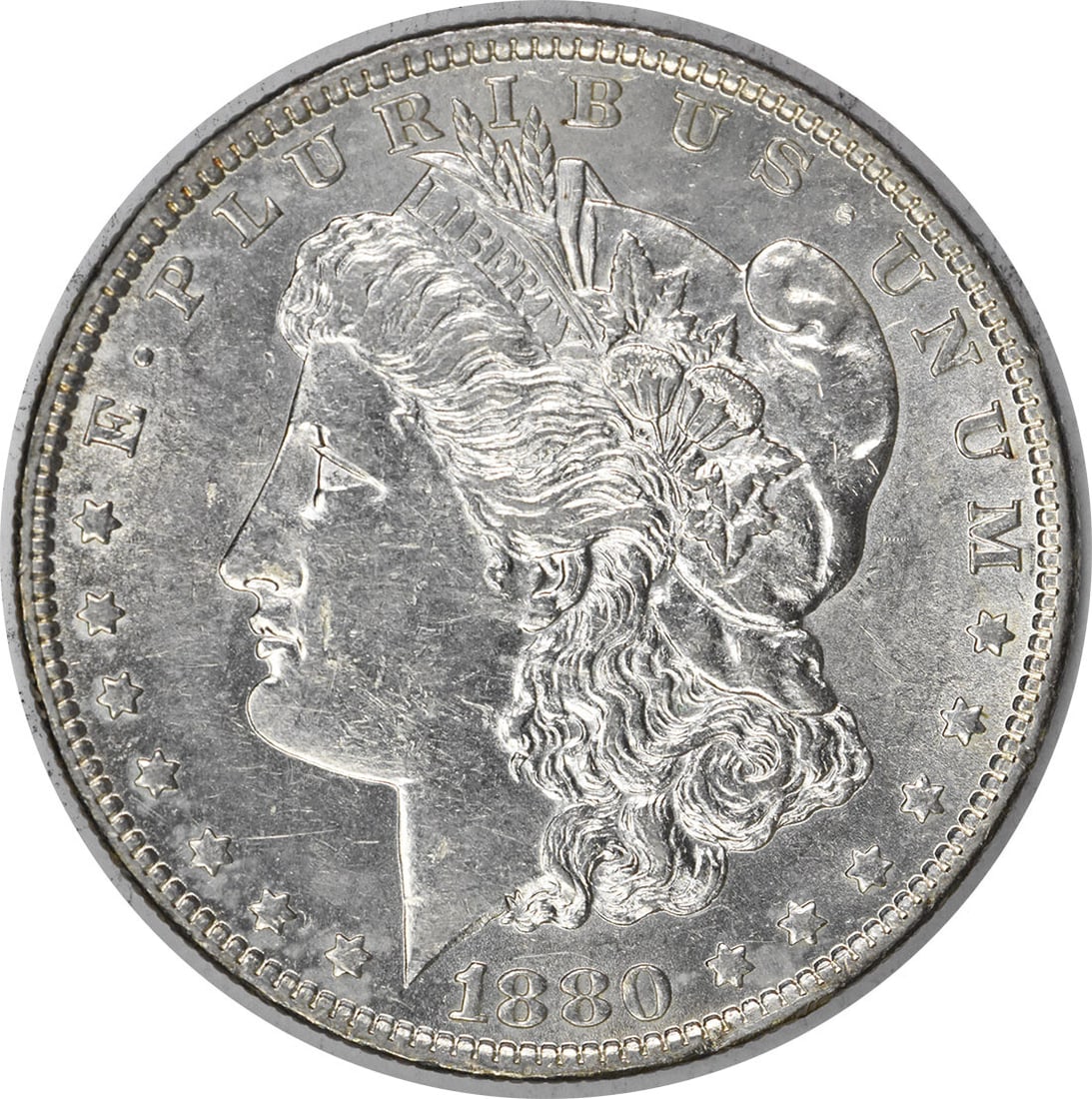 1880-O Morgan Silver Dollar AU Uncertified New Orleans Coin: 1880-O Morgan Silver Dollar AU Uncertified New Orleans Coin This 1880-O Morgan Silver Dollar features a stunning design by George T. Morgan and is made of 90% silver and 10% copper. It is classified a