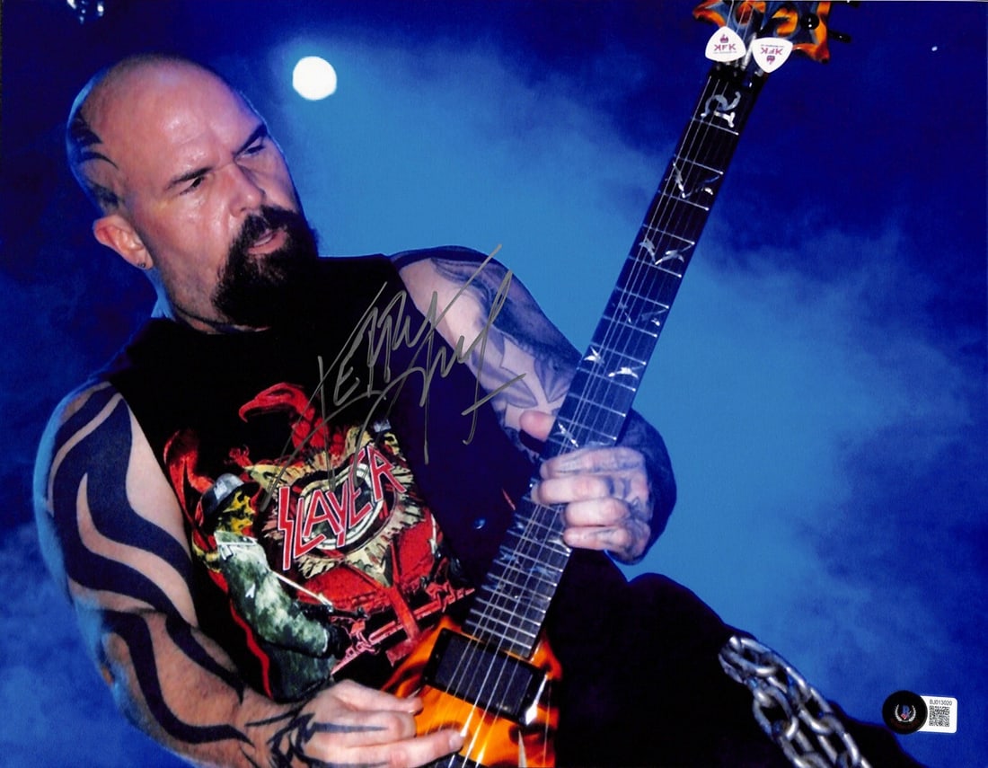 Autographed 11x14 Photo Kerry King Slayer Beckett Authenticated: Autographed 11x14 Photo Kerry King Slayer Beckett Authenticated This 11x14 photograph features the signature of Kerry King, renowned musician from Slayer, in silver permanent marker. The autograph was