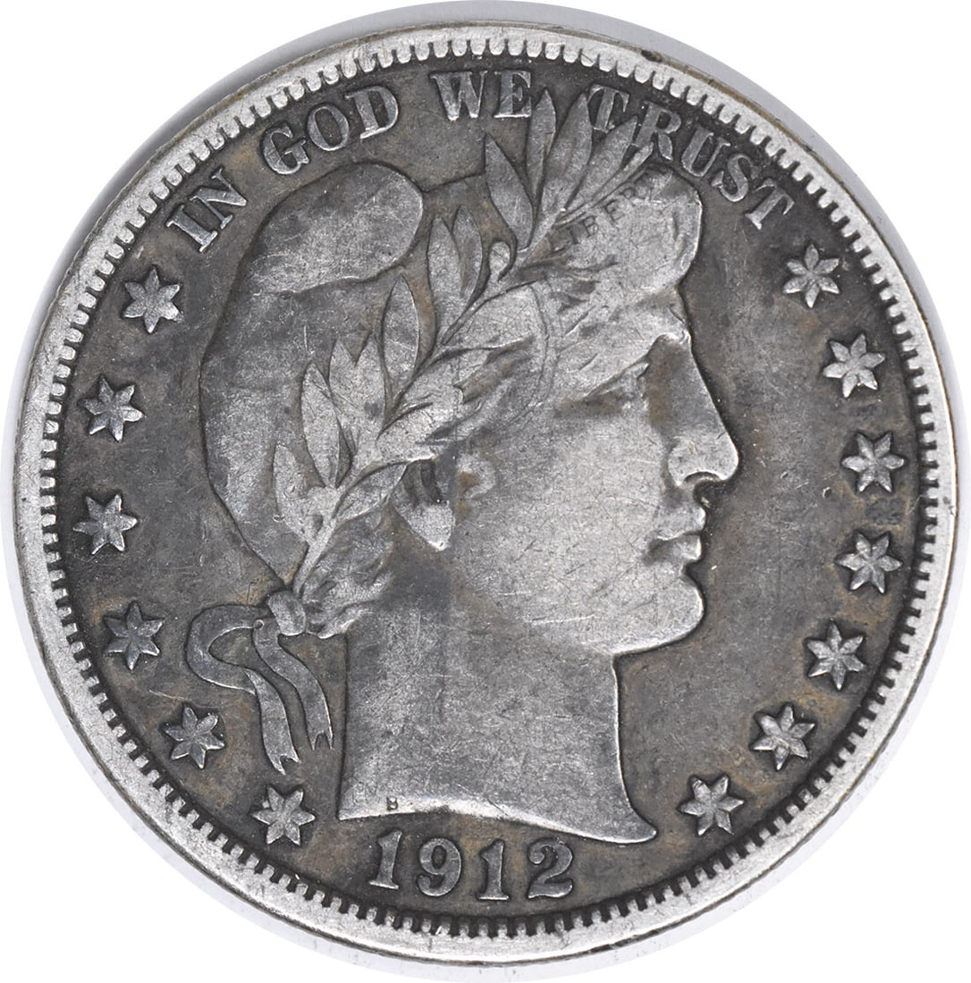 1912 Very Fine Barber Half Dollar 90 Percent Silver Uncertified: 1912 Very Fine Barber Half Dollar 90 Percent Silver Uncertified This 1912 Barber Half Dollar from the United States features a composition of 90% silver and 10% copper. Designed by Charles E. Barber,
