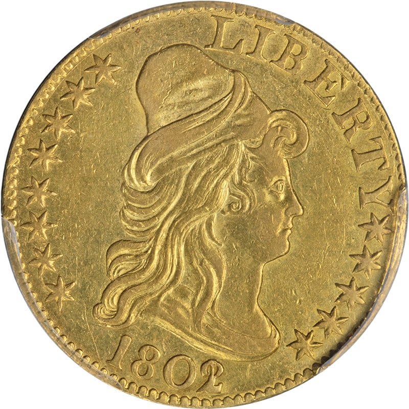 1802/1 Capped Bust Gold $5 Coin PCGS AU Details Nice Strike: 1802/1 Capped Bust Gold $5 Coin PCGS AU Details Nice Strike This 1802/1 Capped Bust Gold $5 coin showcases a captivating design with a nice luster and a strong strike. It is recognized for its eye app