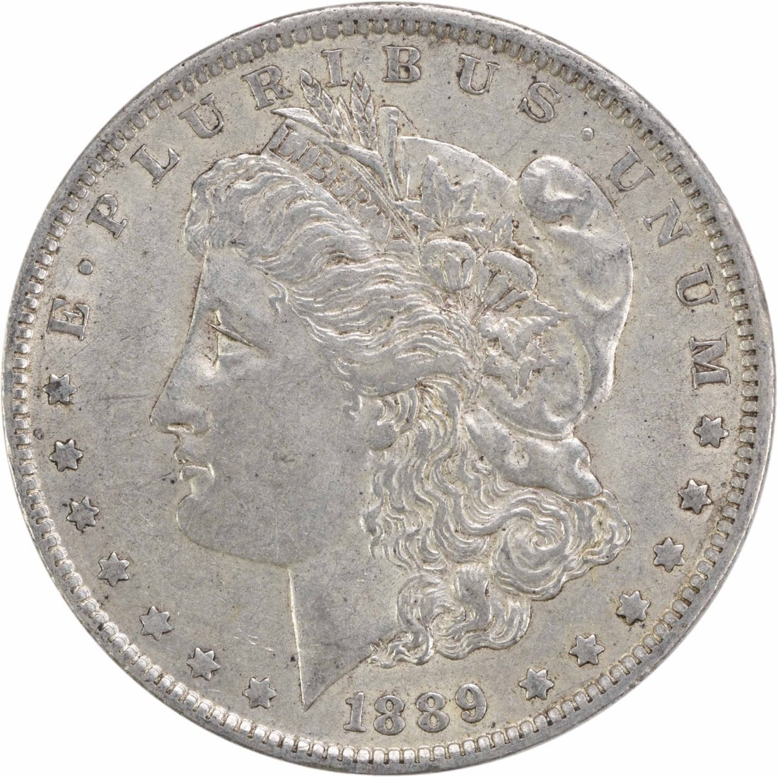 1889-O Morgan Silver Dollar EF Uncertified 90% Silver Coin: 1889-O Morgan Silver Dollar EF Uncertified 90% Silver Coin This 1889-O Morgan Silver Dollar showcases the artistry of designer George T. Morgan. Struck in New Orleans, this coin is composed of 90% sil