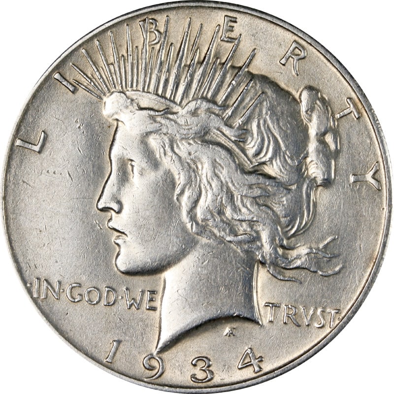 1934 San Francisco Mint Peace Silver Dollar Cleaned Coin: 1934 San Francisco Mint Peace Silver Dollar Cleaned Coin This 1934-S Peace Dollar is a circulated, pre-owned coin that has been cleaned. It is composed of silver with a fineness of 0.9 and was minted
