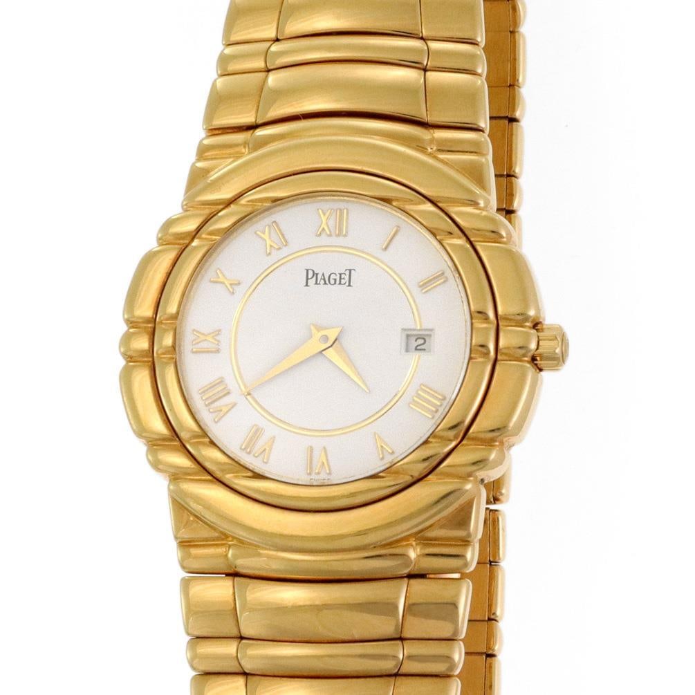 Piaget Tanagra 33mm 18k Yellow Gold Men's Quartz Watch: Piaget Tanagra 33mm 18k Yellow Gold Men's Quartz Watch Experience timeless elegance with this authentic Piaget Tanagra men's wristwatch, featuring a stunning 33mm round case crafted from 18k yellow go