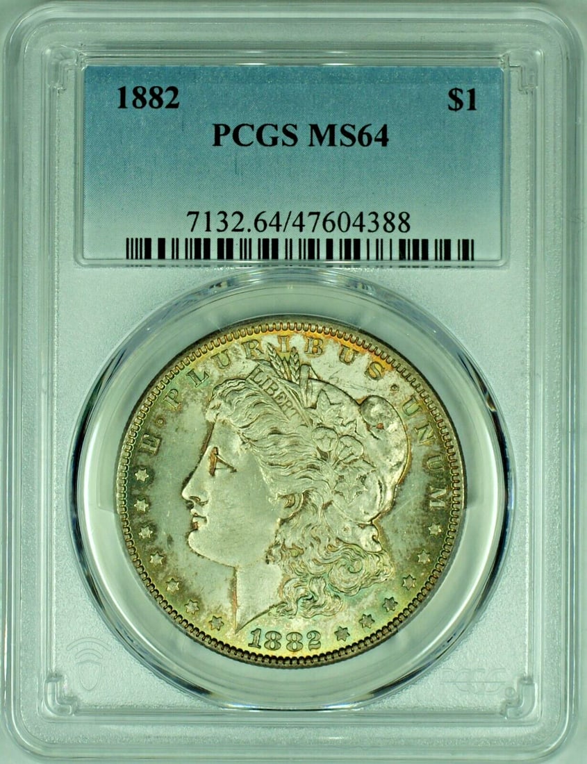 PCGS MS 64 1882 Morgan Dollar Silver Toned Uncirculated Coin: PCGS MS 64 1882 Morgan Dollar Silver Toned Uncirculated Coin This 1882 Morgan Silver Dollar is a toned, uncirculated coin graded MS 64 by PCGS. Featuring the classic Morgan design, it is composed of s