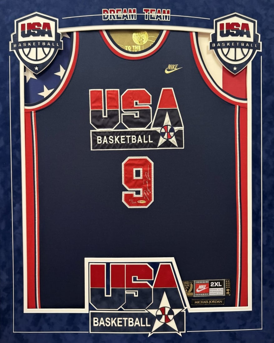 1992 Dream Team Olympics Nike Jersey Autographed by Michael Jordan UDA PSA BAS: 1992 Dream Team Olympics Nike Jersey Autographed by Michael Jordan UDA PSA BAS This is an original 1992 Team USA Dream Team Olympics Nike jersey, custom framed and signed on the front by Michael Jorda