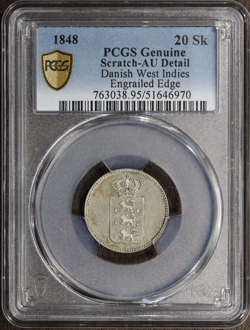1848 Danish West Indies 20 Skilling Silver PCGS AU Detail: 1848 Danish West Indies 20 Skilling Silver PCGS AU Detail This 1848 Danish West Indies 20 Skilling coin features a denomination of 20 Skilling and is composed of silver. It is classified as AU (Almost