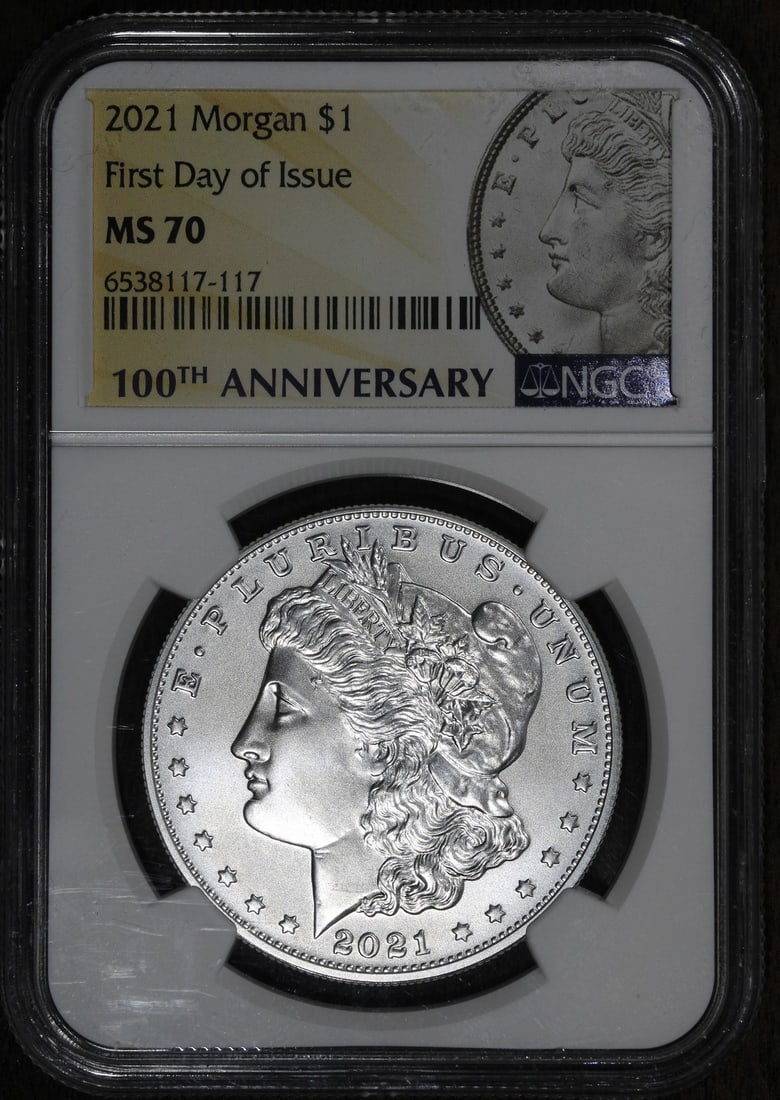 2021 Morgan Silver Dollar MS70 NGC First Day of Issue Philadelphia: 2021 Morgan Silver Dollar MS70 NGC First Day of Issue Philadelphia This 2021-P Morgan Silver Dollar is a stunning piece, graded MS70 by NGC, showcasing its pristine uncirculated condition. Struck from