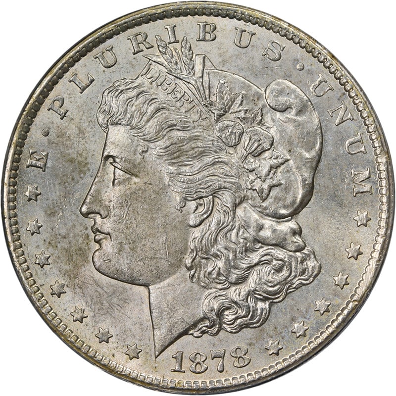 1878-CC Morgan Silver Dollar ANACS MS61 Strong Strike Silver Coin: 1878-CC Morgan Silver Dollar ANACS MS61 Strong Strike Silver Coin This 1878-CC Morgan Silver Dollar is a stunning piece of numismatic history, boasting a certification from ANACS with a grade of MS61.