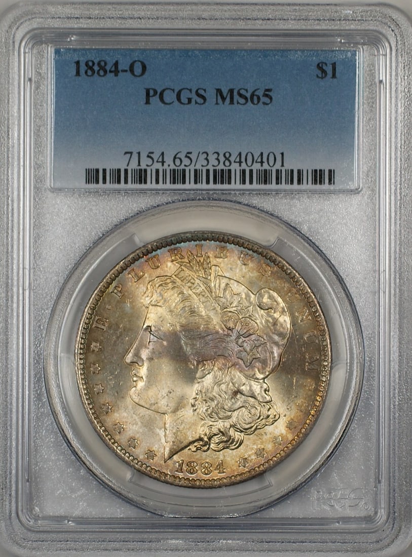 PCGS MS-65 1884-O Morgan Silver Dollar with Attractive Toning: PCGS MS-65 1884-O Morgan Silver Dollar with Attractive Toning This 1884-O Morgan Silver Dollar is certified by PCGS with a grade of MS 65, indicating an uncirculated and well-preserved coin. Struck at