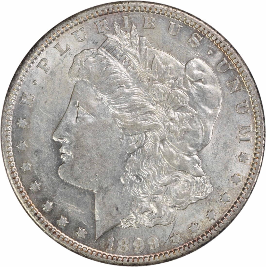 1899-S Morgan Silver Dollar AU Uncertified 90% Silver Coin: 1899-S Morgan Silver Dollar AU Uncertified 90% Silver Coin This 1899-S Morgan Silver Dollar is a stunning piece of numismatic history, featuring a beautiful design by George T. Morgan. The coin, minte