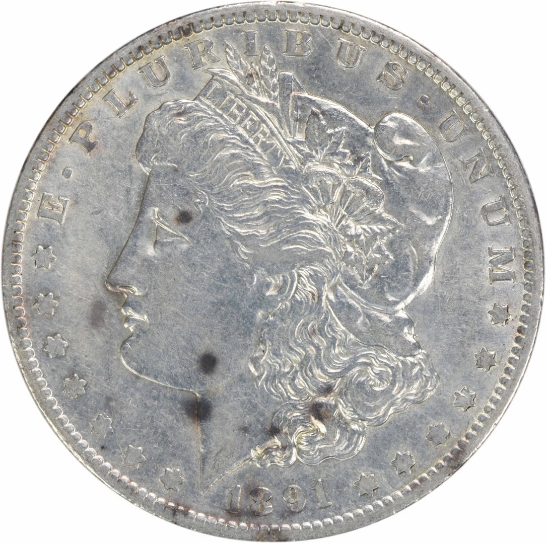 1891-O Morgan Silver Dollar AU Uncertified 90% Silver Coin: 1891-O Morgan Silver Dollar AU Uncertified 90% Silver Coin This 1891-O Morgan Silver Dollar showcases a rich history and craftsmanship, featuring the iconic design by George T. Morgan. The coin is com