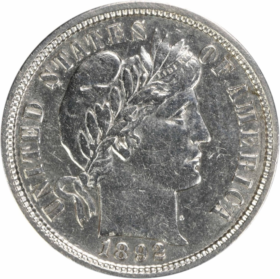 1892 Barber Silver Dime AU Uncertified Philadelphia Mint: 1892 Barber Silver Dime AU Uncertified Philadelphia Mint This 1892 Barber Silver Dime features a stunning design by Charles E. Barber, showcasing an elegant representation of Liberty. The coin is clas