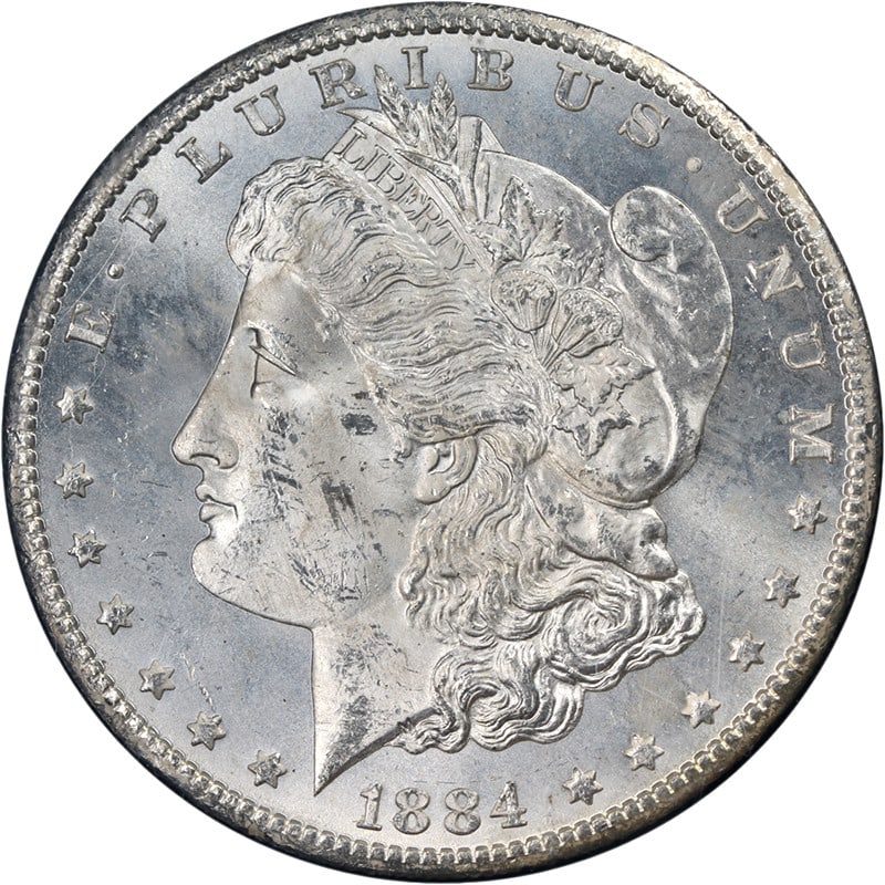 1884-CC GSA Morgan Silver Dollar NGC MS63 Strong Strike: 1884-CC GSA Morgan Silver Dollar NGC MS63 Strong Strike This stunning 1884-CC GSA Morgan Silver Dollar is graded NGC MS63, showcasing excellent eye appeal with remarkable luster and a strong strike. T