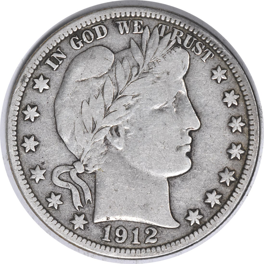 1912-D Barber Half Dollar 50C VF Uncertified Silver Coin: 1912-D Barber Half Dollar 50C VF Uncertified Silver Coin This 1912-D Barber Silver Half Dollar is an exquisite piece from the Denver mint, showcasing the artistry of designer Charles E. Barber. The co