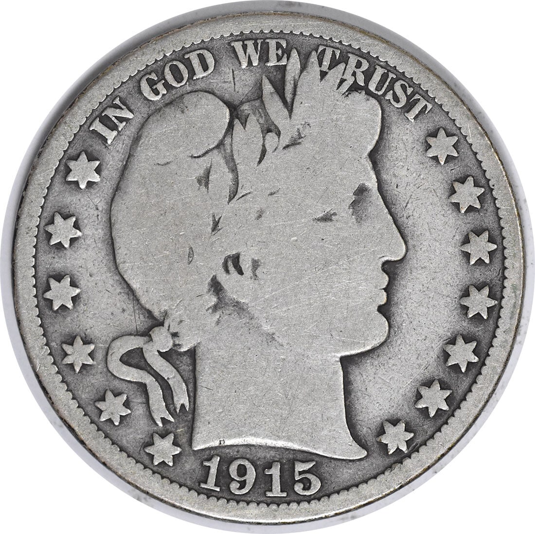 1915 Barber Silver Half Dollar 50C VG Uncertified Philadelphia Mint: 1915 Barber Silver Half Dollar 50C VG Uncertified Philadelphia Mint This 1915 Barber Silver Half Dollar features a classic design by Charles E. Barber, showcasing the iconic Liberty head on the obvers