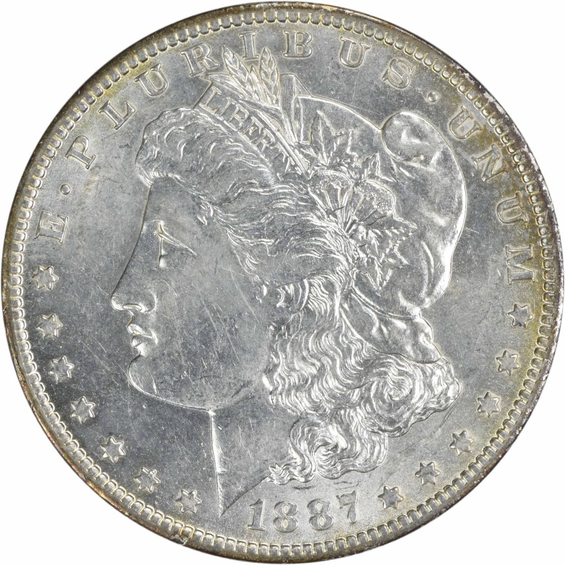 1887-O Morgan Silver Dollar AU Uncertified New Orleans Coin: 1887-O Morgan Silver Dollar AU Uncertified New Orleans Coin This 1887-O Morgan Silver Dollar showcases the artistry of designer George T. Morgan, featuring the iconic Liberty head on the obverse and a