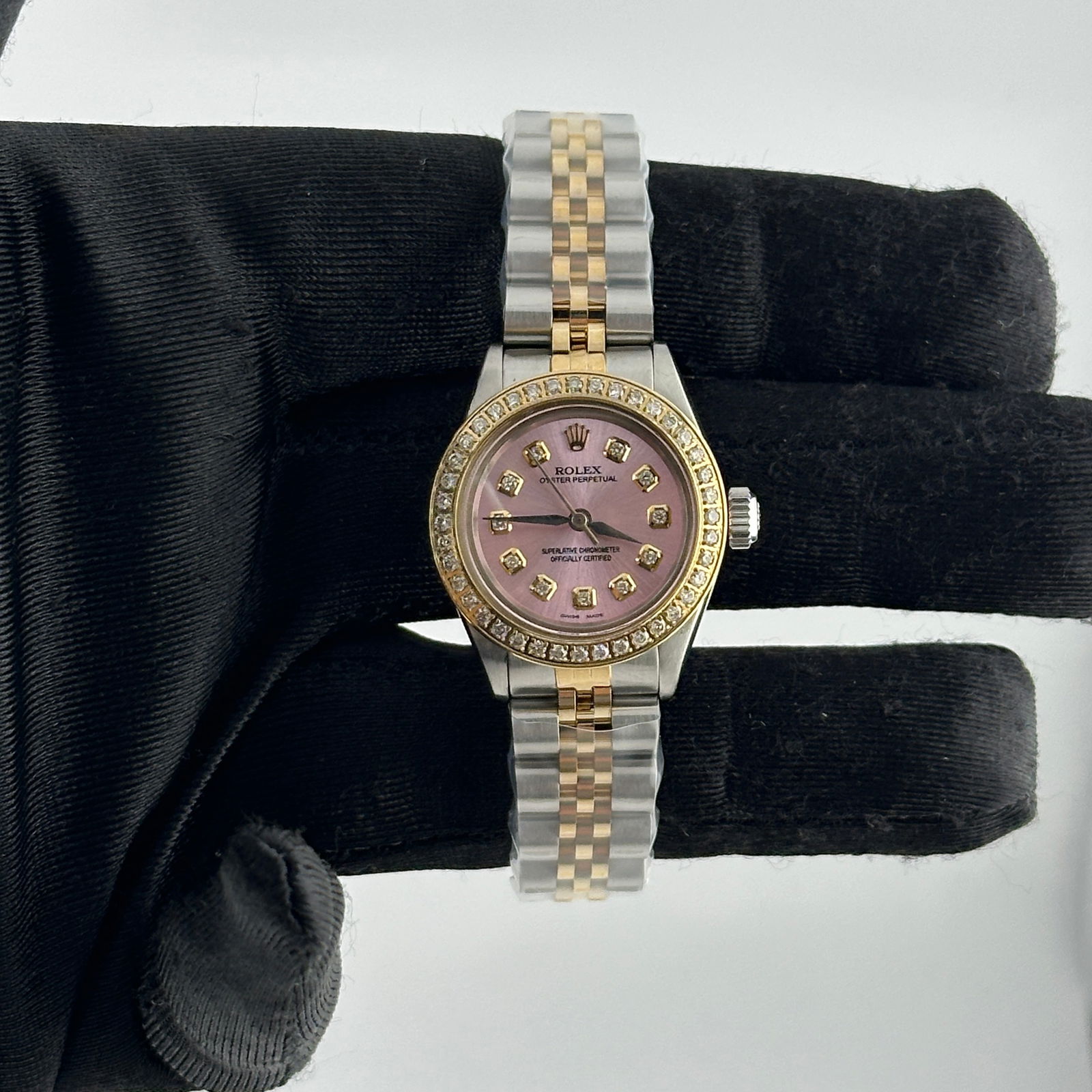 Ladies Rolex 6723 Aftermarket Jubilee Watch Pink Diamond Dial Pave Plated Bezel: Ladies Rolex 6723 Aftermarket Jubilee Watch Pink Diamond Dial Pave Plated Bezel This Rolex Oyster Perpetual features a pink diamond aftermarket dial and a pave plated diamond bezel. It is equipped wit
