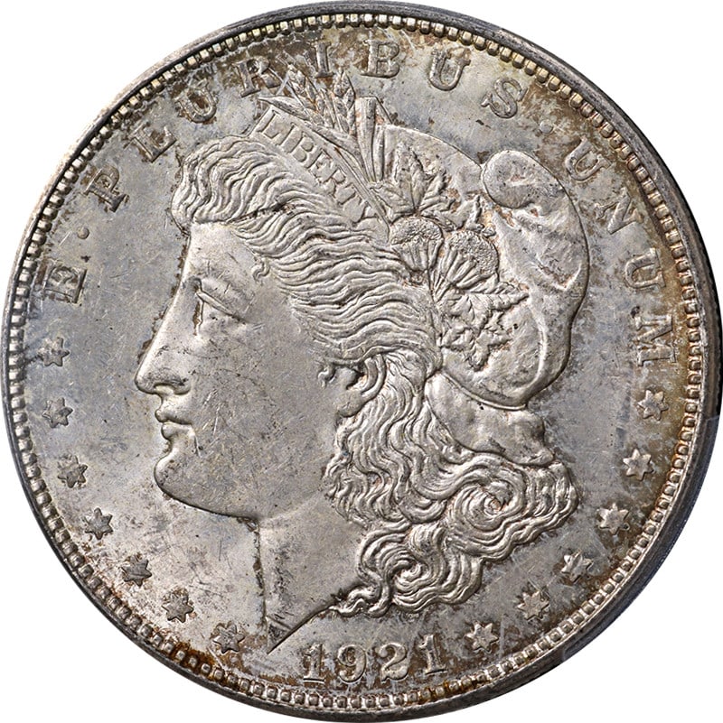 1921-D Morgan Silver Dollar PCGS MS63 Uncirculated Silver Coin: 1921-D Morgan Silver Dollar PCGS MS63 Uncirculated Silver Coin This 1921-D Morgan Silver Dollar is a remarkable example of American numismatic history, certified by PCGS with a grade of MS63. The coin