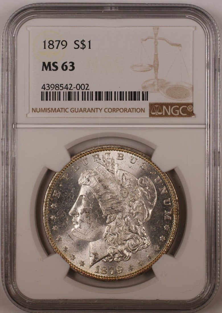 NGC MS-63 1879 Morgan Silver Dollar Philadelphia Mint Certified Coin: NGC MS-63 1879 Morgan Silver Dollar Philadelphia Mint Certified Coin This 1879 Morgan Silver Dollar coin is certified by NGC with a grade of MS-63. Minted in Philadelphia, it is uncirculated and compo
