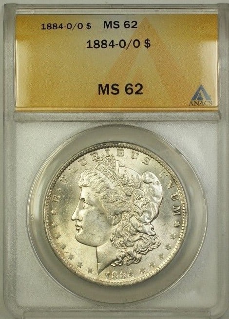 ANACS MS62 1884-O/O Morgan Dollar Silver Coin New Orleans Mint: ANACS MS62 1884-O/O Morgan Dollar Silver Coin New Orleans Mint This is an 1884-O/O Over Mint Mark Morgan Silver Dollar graded MS-62 by ANACS. Struck at the New Orleans Mint, this uncirculated coin is
