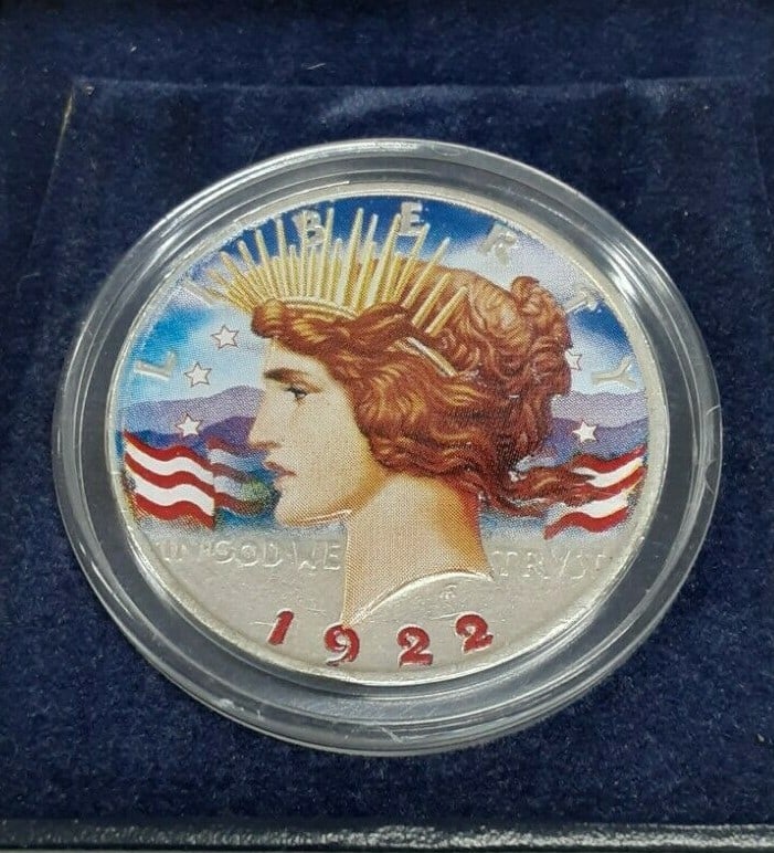 Colorized 1922-D Peace Silver Dollar Uncirculated $1 Coin From Denver Mint: Colorized 1922-D Peace Silver Dollar Uncirculated $1 Coin From Denver Mint This 1922-D American Peace Silver Dollar features a beautifully colorized design on both sides. It is an uncirculated $1 coin