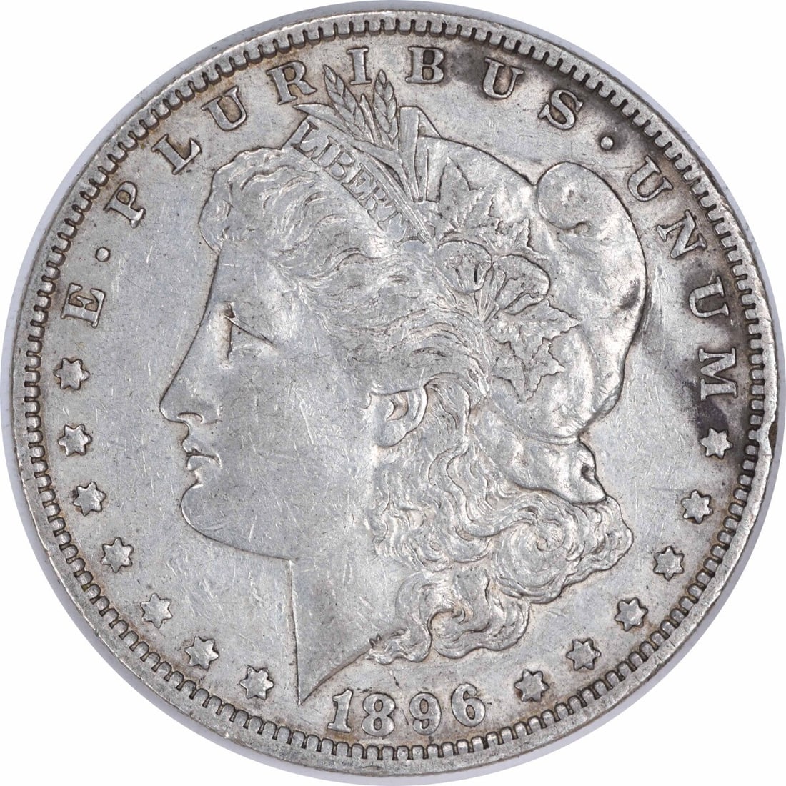 1896-O Morgan Silver Dollar 90% Silver Uncertified Coin: 1896-O Morgan Silver Dollar 90% Silver Uncertified Coin This 1896-O Morgan Silver Dollar is a classic collectible coin featuring the iconic design by George T. Morgan. The coin showcases a grade of Ex