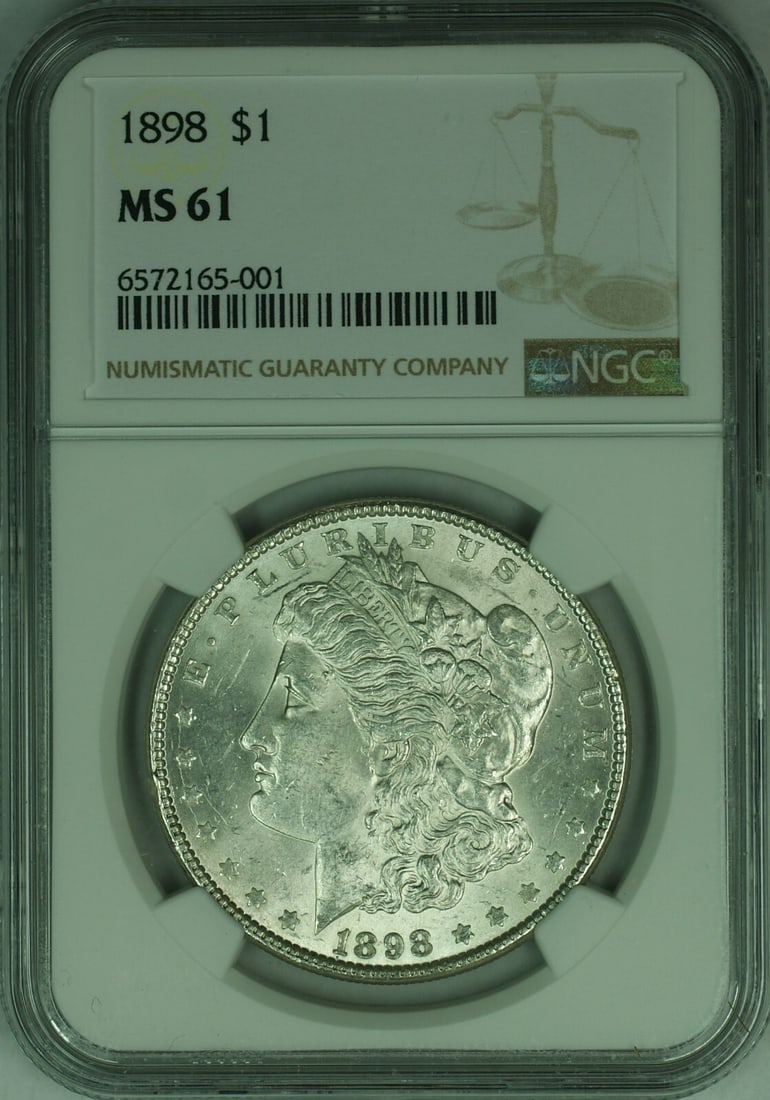 NGC MS-61 1898 Philadelphia Morgan Silver Dollar $1 Coin: NGC MS-61 1898 Philadelphia Morgan Silver Dollar $1 Coin This 1898 Morgan Silver Dollar is a $1 coin certified by NGC with a grade of MS-61. Struck at the Philadelphia Mint, it is composed of silver a