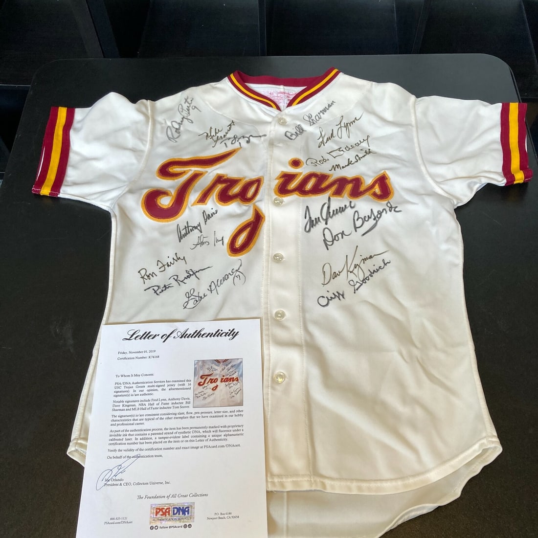 Rare USA Trojans Legends Signed Jersey with 16 Signatures Tom Seaver PSA DNA: Rare USA Trojans Legends Signed Jersey with 16 Signatures Tom Seaver PSA DNA This authentic 1980's game-issued jersey from the USA Trojans Legends is a rare collectible featuring 16 signatures, includ