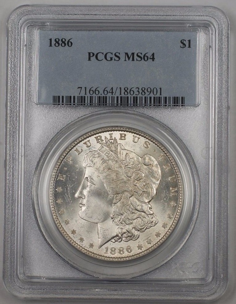 PCGS MS64 1886 Morgan Dollar Silver Coin Uncirculated Philadelphia Mint: PCGS MS64 1886 Morgan Dollar Silver Coin Uncirculated Philadelphia Mint This is an 1886 US Morgan Silver Dollar coin graded MS-64 by PCGS. Minted in Philadelphia, this uncirculated coin is composed of