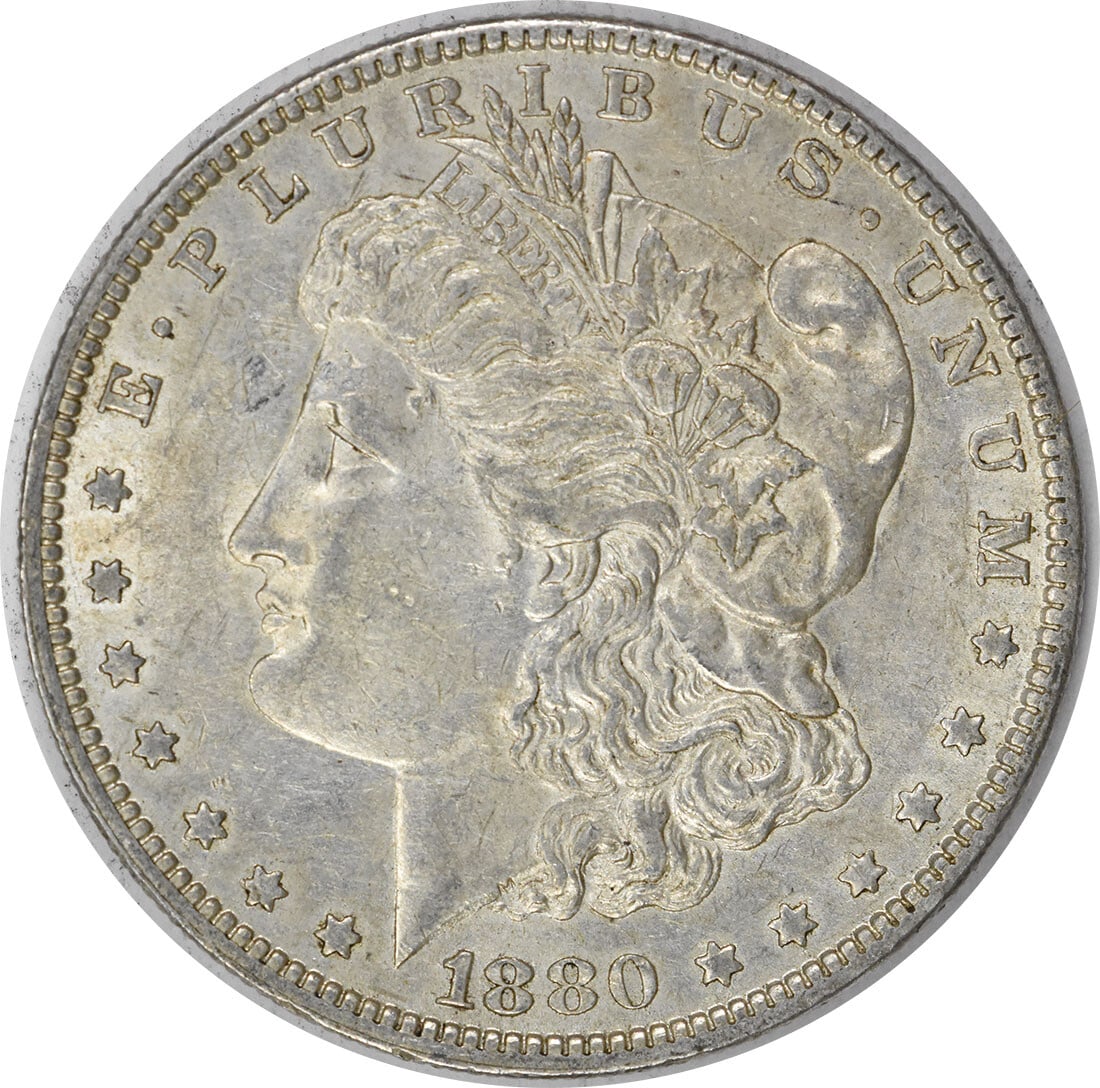 1880-O Morgan Silver Dollar AU Uncertified George T Morgan Design: 1880-O Morgan Silver Dollar AU Uncertified George T Morgan Design This 1880-O Morgan Silver Dollar is a stunning example of U.S. coinage, featuring a beautiful design by George T. Morgan. The coin is