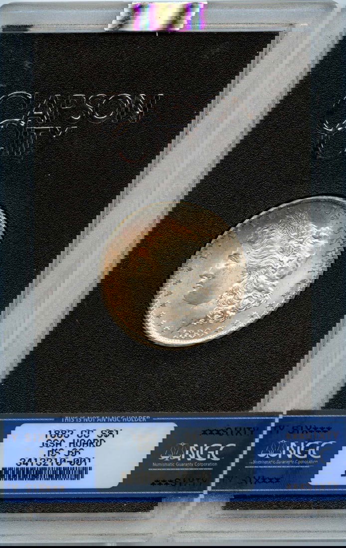 1883-CC NGC MS66 Toned Morgan Silver Dollar GSA Hoard: 1883-CC NGC MS66 Toned Morgan Silver Dollar GSA Hoard This stunning 1883-CC Silver Morgan Dollar boasts a high grade of MS66, certified by NGC. Minted in Carson City, this uncirculated coin is part of