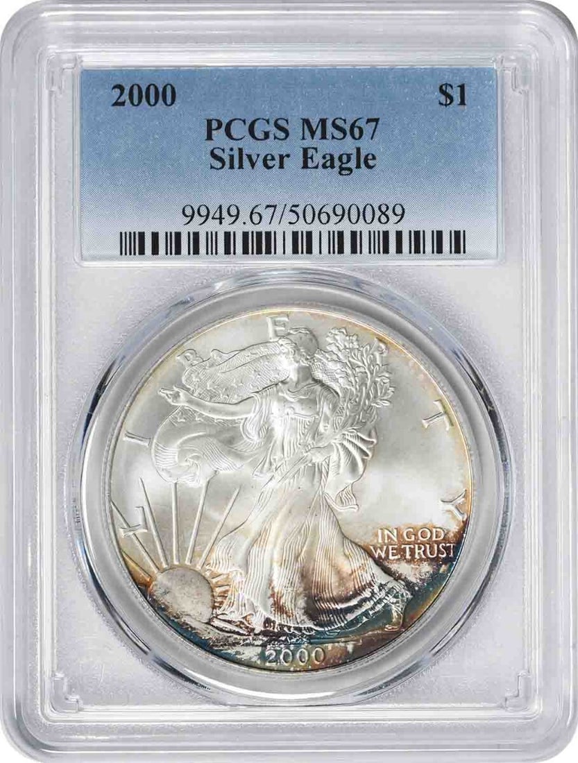 2000 American Silver Eagle MS67 PCGS Toned Coin with Teal Brown Accents: 2000 American Silver Eagle MS67 PCGS Toned Coin with Teal Brown Accents This 2000 American Silver Eagle coin is graded MS67 by PCGS, showcasing its pristine condition. Featuring a stunning toning with
