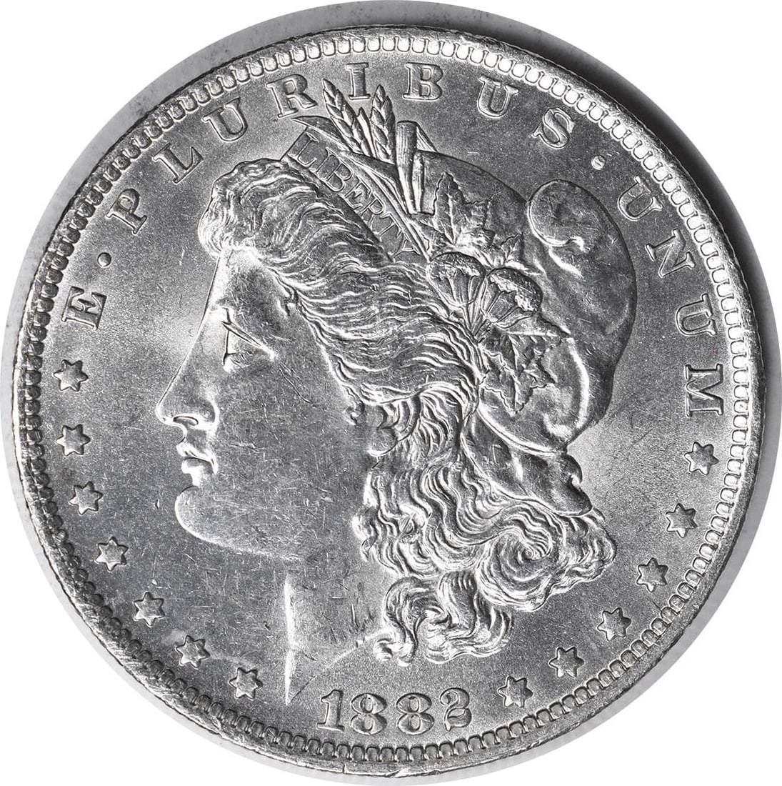 1882-O Morgan Silver Dollar AU Uncertified Coin by George T. Morgan: 1882-O Morgan Silver Dollar AU Uncertified Coin by George T. Morgan This 1882-O/S VAM 3 Morgan Silver Dollar showcases a beautiful design by George T. Morgan. Minted in New Orleans, this coin features