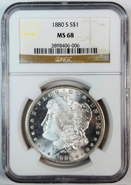 NGC MS68 1880 San Francisco Morgan Silver Dollar Uncirculated USA: NGC MS68 1880 San Francisco Morgan Silver Dollar Uncirculated USA This is an un-used 1880 Morgan Silver Dollar, minted in San Francisco and certified by NGC with a high grade of MS 68. The coin is com