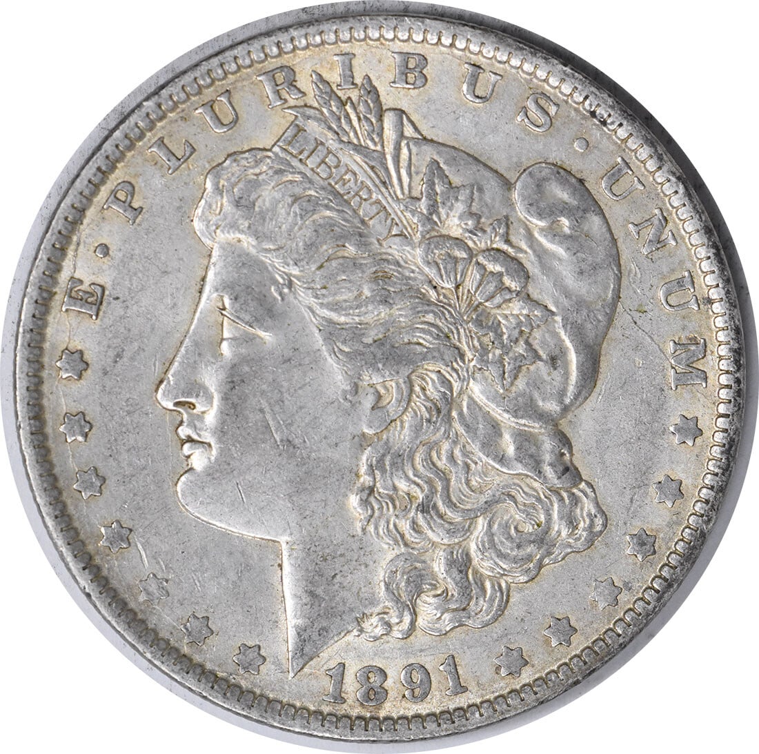 About Uncirculated 1891 O Morgan Dollar Uncertified Silver Coin: About Uncirculated 1891 O Morgan Dollar Uncertified Silver Coin This 1891-O Morgan Silver Dollar is an uncertified, circulated coin minted in New Orleans. Struck in 90% silver and 10% copper, it featu
