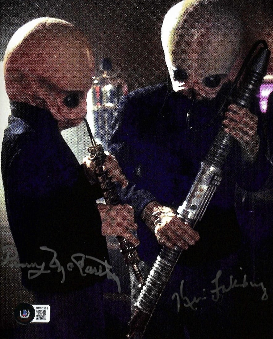 8x10 Star Wars Cantina Band Photo Signed by Kim Falkinburg and Penny McCarthy Beckett: 8x10 Star Wars Cantina Band Photo Signed by Kim Falkinburg and Penny McCarthy Beckett This is an original 8x10 photograph from Star Wars: A New Hope, autographed by Kim Falkinburg and Penny McCarthy,