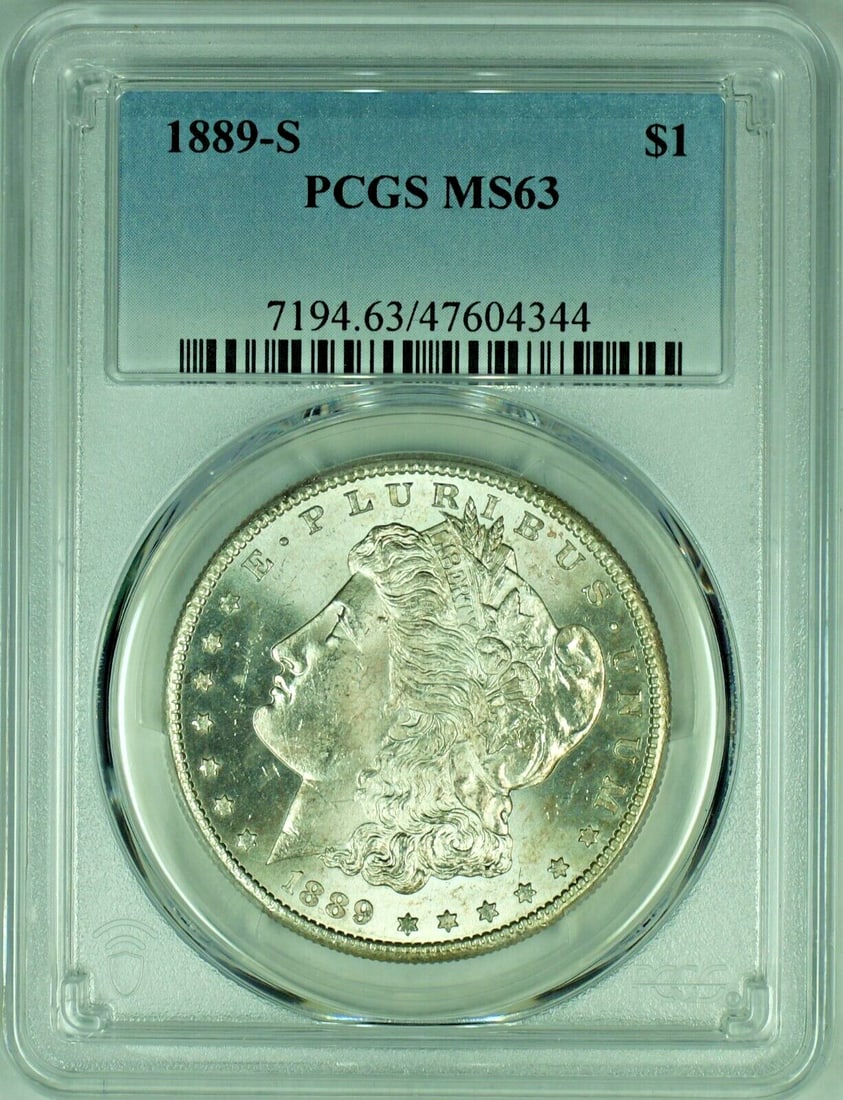 PCGS MS 63 1889-S San Francisco Morgan Silver Dollar: PCGS MS 63 1889-S San Francisco Morgan Silver Dollar This is an 1889-S Morgan Silver Dollar, graded MS 63 by PCGS. The coin is uncirculated and was minted in San Francisco. It is composed of silver an
