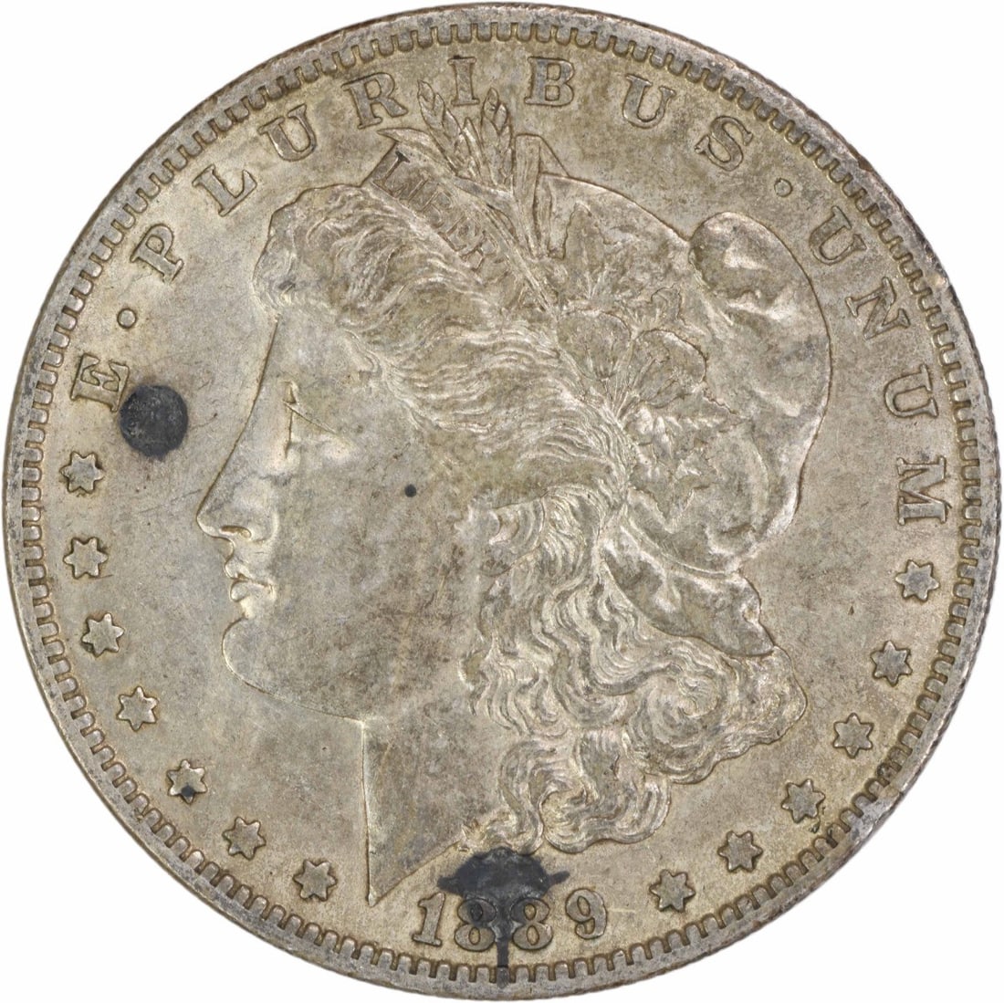 EF Grade 1889-O Morgan Dollar 90% Silver Uncertified US Coin: EF Grade 1889-O Morgan Dollar 90% Silver Uncertified US Coin This 1889-O Morgan Silver Dollar is a circulated coin from the New Orleans Mint, featuring a composition of 90% silver and 10% copper. Grad