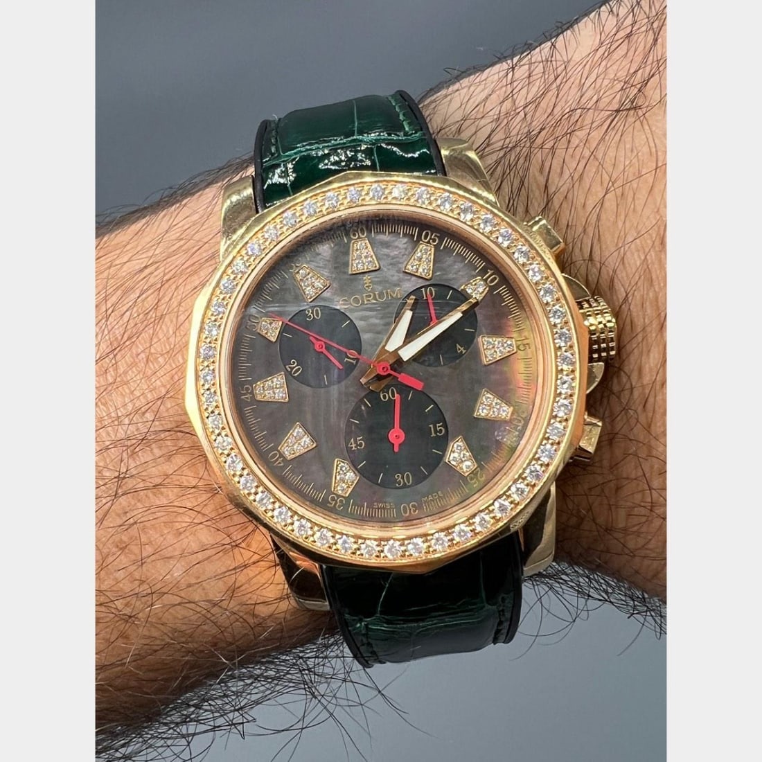Admirals Cup Chronograph 39mm Watch 18K Automatic Mother of Pearl Dial: Admirals Cup Chronograph 39mm Watch 18K Automatic Mother of Pearl Dial This Corum Admiral's Cup Chronograph features an 18K case measuring 39mm. The watch is set with all original diamonds and showcas