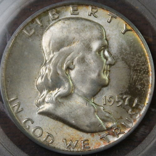 PCGS MS-65 FBL 1957-D Franklin Silver Half Dollar With Light Green Toning: PCGS MS-65 FBL 1957-D Franklin Silver Half Dollar With Light Green Toning This is a 1957-D Franklin Half Dollar graded MS-65 with Full Bell Lines (FBL) by PCGS. The coin is uncirculated and features l