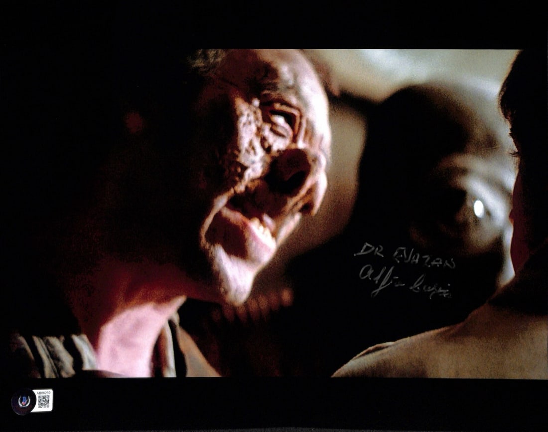 Alfie Curtis Signed 11x14 Dr. Evazan Photo with Beckett LOA: Alfie Curtis Signed 11x14 Dr. Evazan Photo with Beckett LOA This autographed 11x14 color photograph features Alfie Curtis as Dr. Evazan from the original Star Wars movie. The signature is written in s