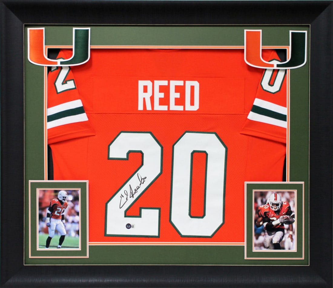 Ed Reed Miami Hurricanes Signed Framed Jersey BAS Witnessed: Ed Reed Miami Hurricanes Signed Framed Jersey BAS Witnessed This authentic framed jersey features the signature of Ed Reed, a legendary player from the Miami Hurricanes football team. The vibrant oran