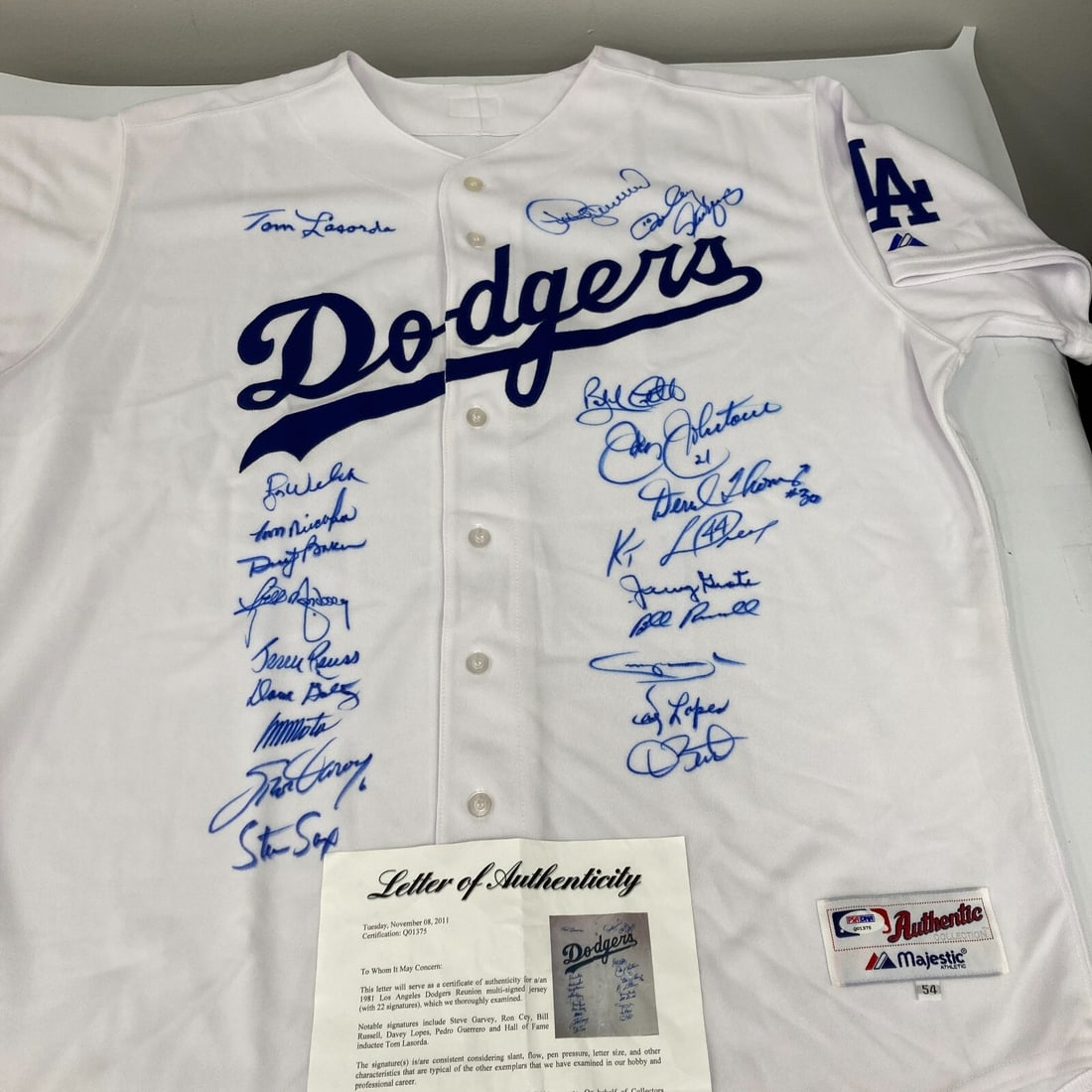 1981 Los Angeles Dodgers Team Signed Jersey with PSA/DNA COA: 1981 Los Angeles Dodgers Team Signed Jersey with PSA/DNA COA Celebrate the legacy of the 1981 Los Angeles Dodgers with this authentic multi-signed jersey. This original piece features the signatures o