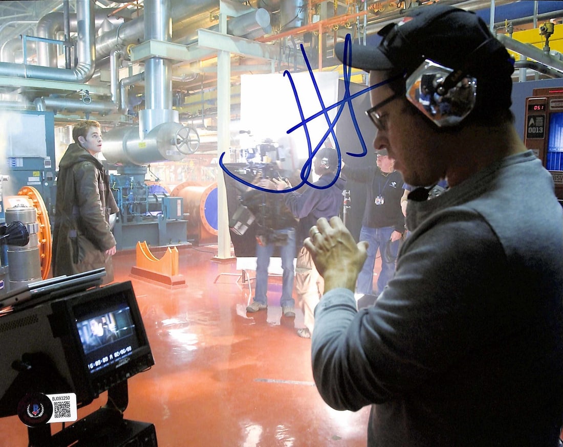 J.J. Abrams Signed Star Trek 8x10 Photo Beckett Certified: J.J. Abrams Signed Star Trek 8x10 Photo Beckett Certified This is an original 8x10 color photograph of director J.J. Abrams, signed in bold ink. The photo captures Abrams on set during the making of S
