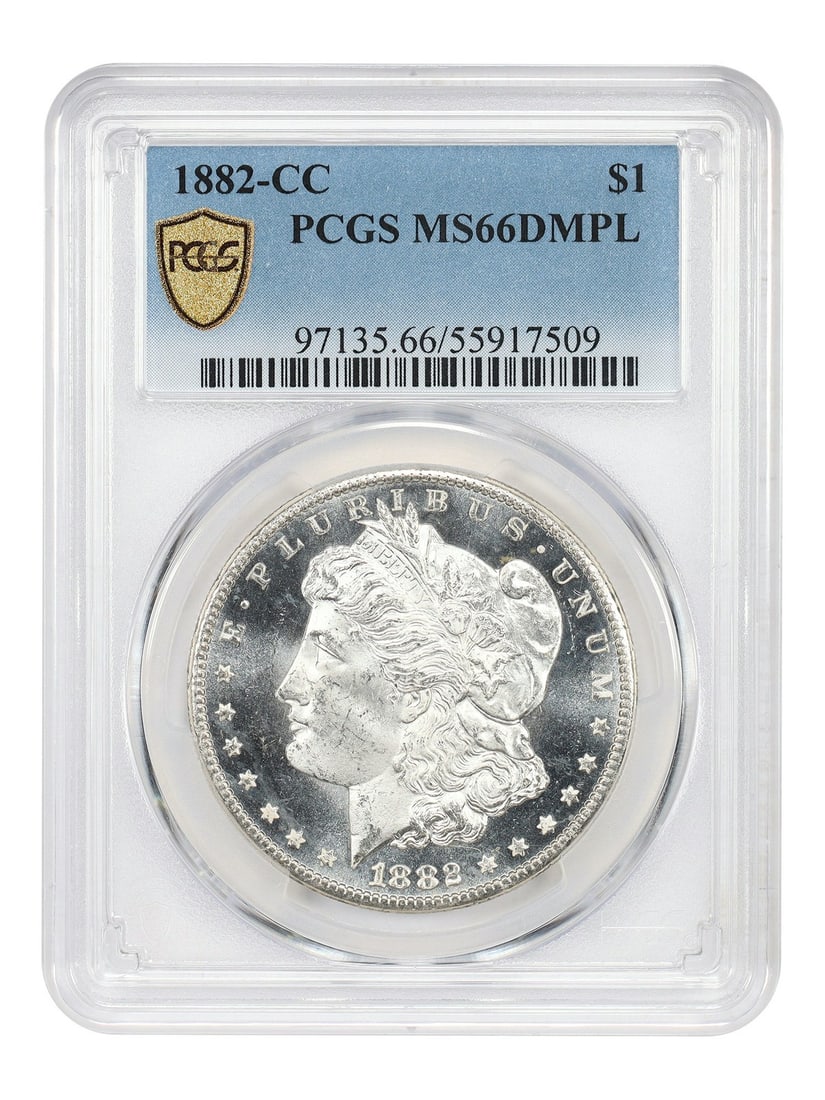 PCGS MS66DMPL 1882 Carson City Morgan Silver Dollar: PCGS MS66DMPL 1882 Carson City Morgan Silver Dollar This 1882-CC Morgan Dollar is graded MS66DMPL by PCGS, indicating an uncirculated coin with deep mirror prooflike surfaces. Struck at the Carson Cit