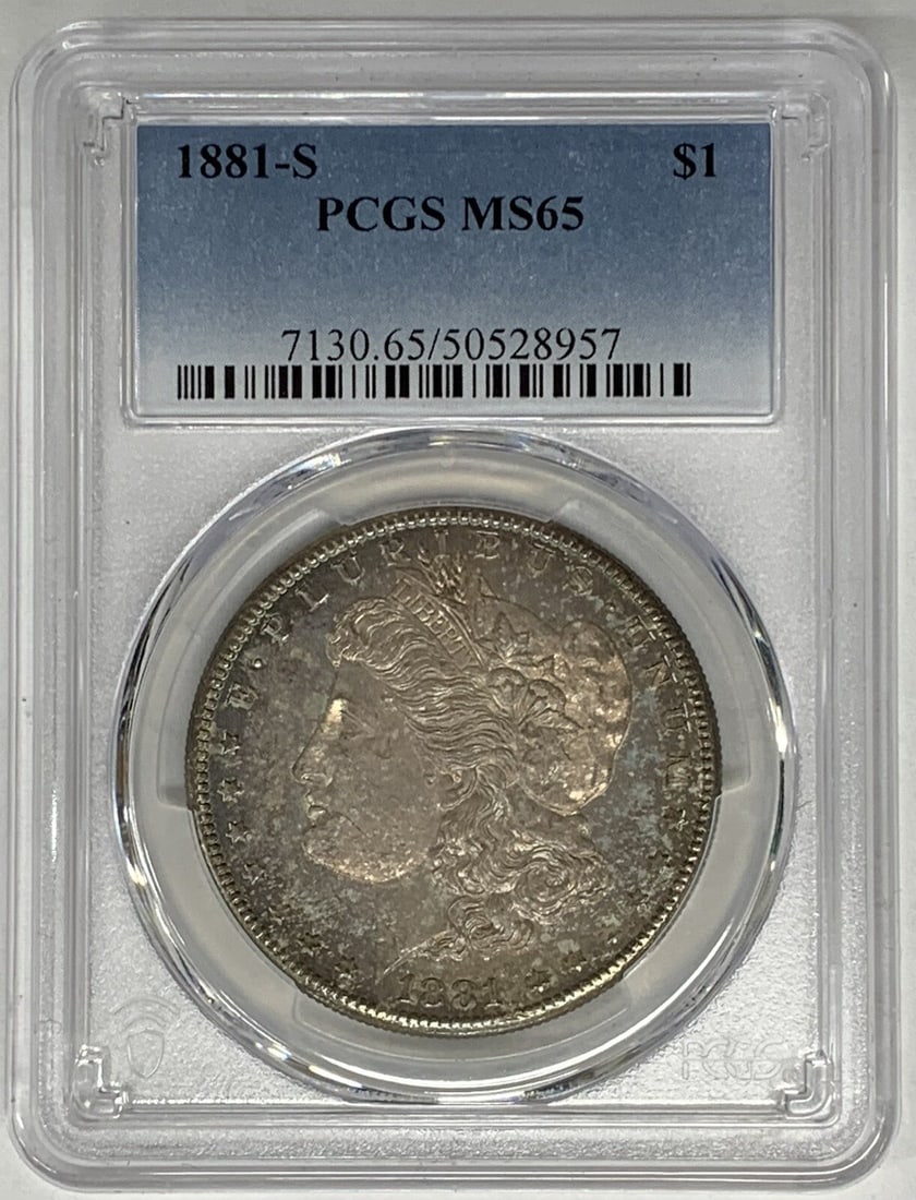 PCGS MS 65 1881-S Morgan Silver Dollar with Toning: PCGS MS 65 1881-S Morgan Silver Dollar with Toning This is an 1881-S Morgan Silver Dollar featuring a toned finish. The coin is uncirculated and has been graded MS 65 by PCGS, ensuring its high qualit