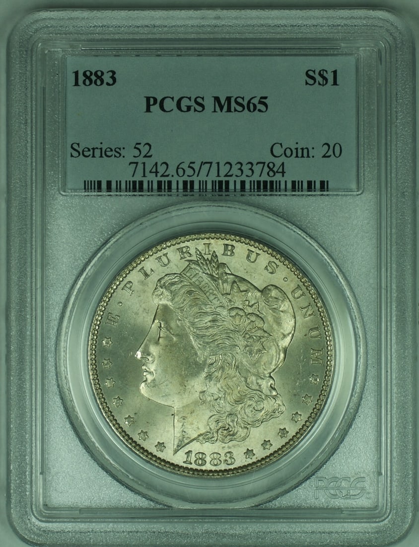 PCGS MS 65 Graded 1883 Silver Morgan Dollar Uncirculated: PCGS MS 65 Graded 1883 Silver Morgan Dollar Uncirculated This 1883 Morgan Silver Dollar is certified by PCGS with a grade of MS 65. It is an uncirculated coin from the United States, featuring the cla